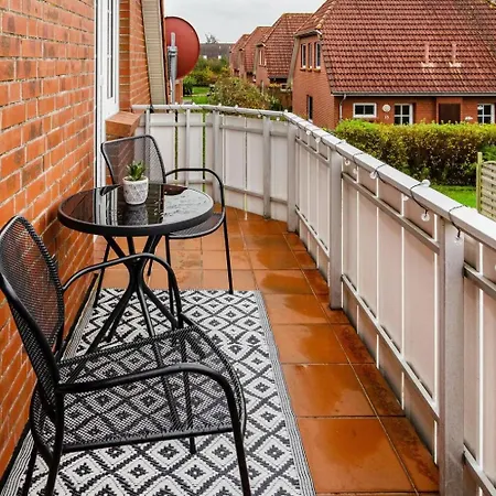 Апартаменты Huebsche Ferienwohnung In Nessmersiel, Mit Balkon, Wlan, Haustiere Gestattet. Несмерзиль